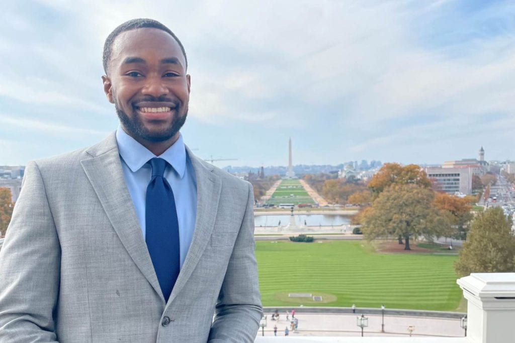Kyle Smith, B.S. PUBP 2022, stands in front of the Washington Monument. Smith worked as a U.S. Senate staff after graduation.